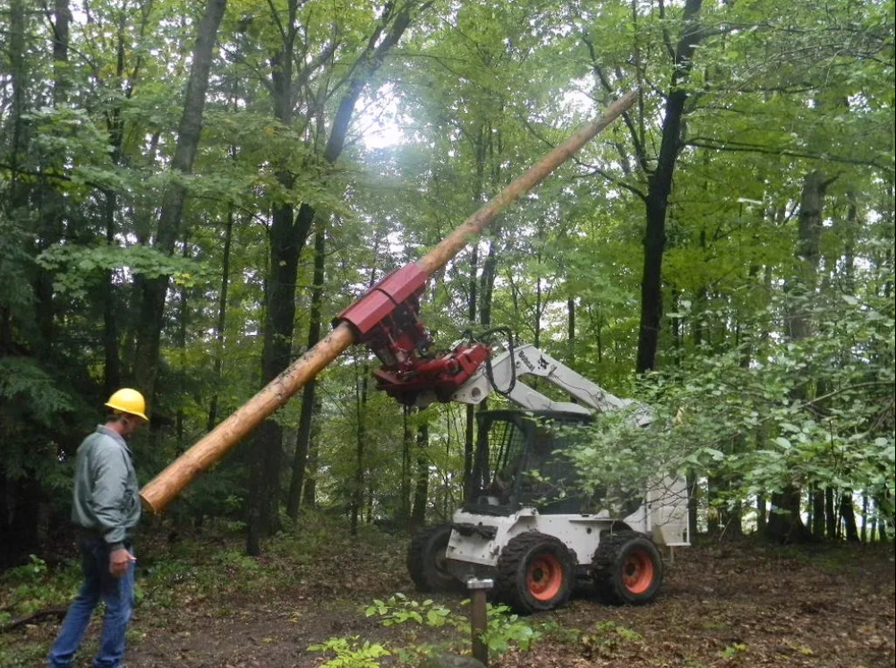 Skid Steer Pole Setter